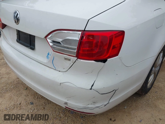 2014 Volkswagen Jetta SE with VIN 3VWD17AJ0EM371501, listed as a IAAI auction lot 42597170 with 166,686 mi miles and . Bid and sale history available at DreamBid. Image 6.