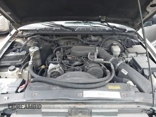 2000 GMC Jimmy SLT Convenience with VIN 1GKDT13W9Y2216559, listed as a IAAI auction lot 41855802 with 196,759 mi miles. Bid and sale history available at carsss.com. Image 10.