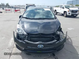 2014 Toyota Prius One z VIN JTDKDTB33E1569335, wystawiony jako IAAI lot #42483772 z przebiegiem Nie podano mil oraz . Historia ofert i sprzedaży dostępna na DreamBid. Obrazek 11.