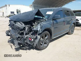 2018 Dodge Journey Crossroad z VIN 3C4PDCGB4JT327792, wystawiony jako IAAI lot #42012960 z przebiegiem 121 736 mil mil oraz . Historia ofert i sprzedaży dostępna na DreamBid. Obrazek 18.