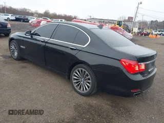2011 BMW 7 Series 740i with VIN WBAKA4C55BC612584, listed as a IAAI auction lot 42021367 with 139,190 mi miles. Bid and sale history available at carsss.com. Image 3.