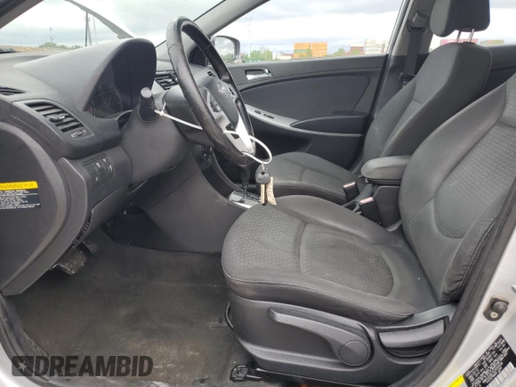 2012 Hyundai Accent SE with VIN KMHCU5AE7CU054509, listed as a Copart auction lot 57726645 with 93,631 mi miles and Salvage title. Bid and sale history available at DreamBid. Image 7.