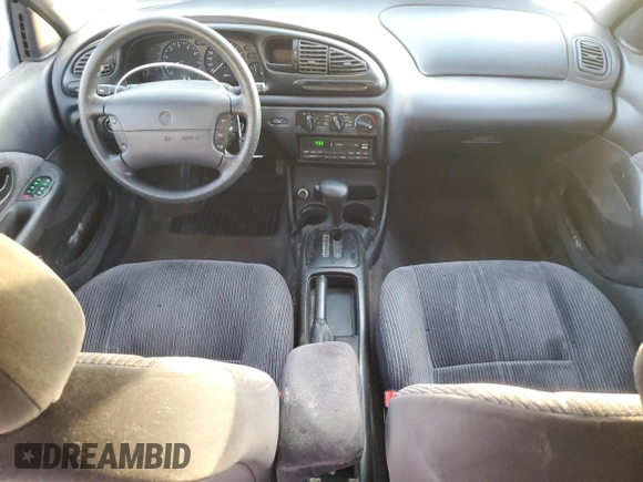 1999 Mercury Mystique GS z VIN 1MEFM6532XK638087, wystawiony jako Copart lot #85269414 z przebiegiem 192 506 mil mil oraz Szkody całkowita. Historia ofert i sprzedaży dostępna na DreamBid. Obrazek 8.
