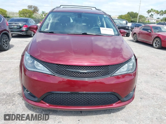 2017 Chrysler Pacifica Touring L with VIN 2C4RC1BG6HR739602, listed as a IAAI auction lot 42085250 with 96,377 mi miles and . Bid and sale history available at DreamBid. Image 12.