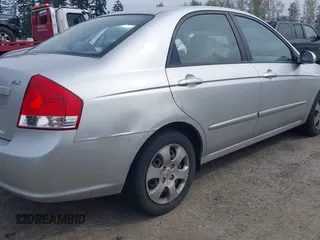 2009 Kia Spectra EX with VIN KNAFE221595659217, listed as a IAAI auction lot 42014406 with 140,527 mi miles. Bid and sale history available at carsss.com. Image 6.