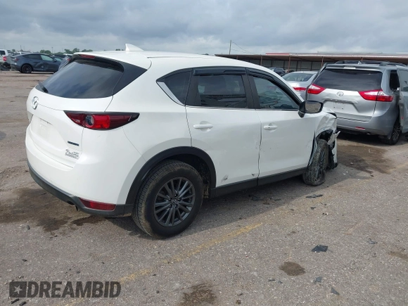 2020 Mazda CX-5 Touring z VIN JM3KFBCM2L0786784, wystawiony jako IAAI lot #42127457 z przebiegiem 62 665 mil mil oraz . Historia ofert i sprzedaży dostępna na DreamBid. Obrazek 4.