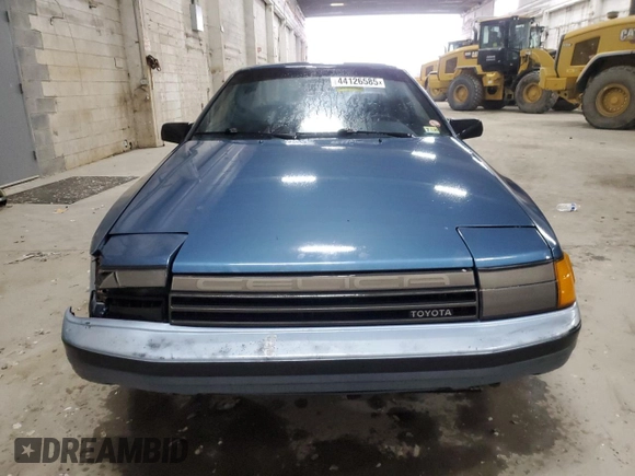 1987 Toyota Celica with VIN JT2ST67C3H7085589, listed as a Copart auction lot 44126585 with 81,830 mi miles and Salvage title. Bid and sale history available at DreamBid. Image 5.
