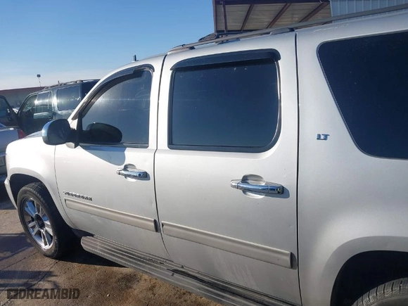 2013 Chevrolet Suburban LT with VIN 1GNSCJE00DR266075, listed as a IAAI auction lot 41338826 with 291,358 mi miles. Bid and sale history available at carsss.com. Image 15.