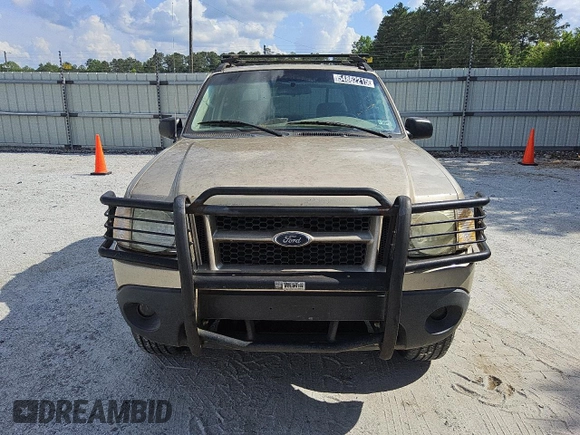 2004 Ford Explorer Sport Trac XLS z VIN 1FMZU77K64UA90633, wystawiony jako Copart lot #54862215 z przebiegiem 274 354 mil mil oraz Czysty tytuł • Clean title. Historia ofert i sprzedaży dostępna na DreamBid. Obrazek 5.