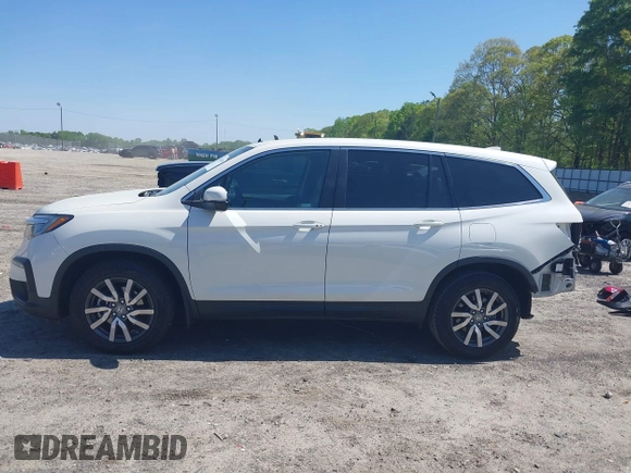 2019 Honda Pilot EX-L with VIN 5FNYF5H57KB038019, listed as a IAAI auction lot 41994410 with 126,738 mi miles and . Bid and sale history available at carsss.com. Image 15.