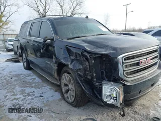 2015 GMC Yukon XL SLT with VIN 1GKS2HKC6FR257133, listed as a IAAI auction lot 41385913 with 150,238 mi miles. Bid and sale history available at carsss.com. Image 1.