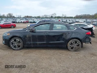 2020 Ford Fusion Titanium with VIN 3FA6P0D9XLR174523, listed as a IAAI auction lot 42100113 with 100,602 mi miles and . Bid and sale history available at DreamBid. Image 15.