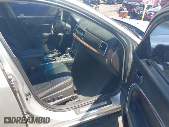 2011 Lincoln MKZ with VIN 3LNHL2GC6BR764892, listed as a IAAI auction lot 42061202 with 160,697 mi miles. Bid and sale history available at carsss.com. Image 5.