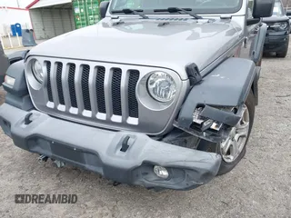 2018 Jeep Wrangler Unlimited Sport z VIN 1C4HJXDG1JW133543, wystawiony jako IAAI lot #41730522 z przebiegiem 81 667 mil mil oraz . Historia ofert i sprzedaży dostępna na DreamBid. Obrazek 6.