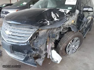 2016 Chevrolet Traverse LT with VIN 1GNKRGKD4GJ212483, listed as a IAAI auction lot 39987074 with 127,444 mi miles. Bid and sale history available at carsss.com. Image 6.