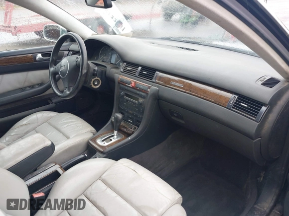 2002 Audi S6 z VIN WAUXU54B62N070925, wystawiony jako IAAI lot #38122381 z przebiegiem 219 441 mil mil oraz . Historia ofert i sprzedaży dostępna na DreamBid. Obrazek 5.