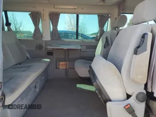2001 Volkswagen EuroVan MV с VIN WV2MB47071H128880, выставлен на аукционе Copart как лот 48175195 с пробегом 182 488 миль миль и Чистый • Clean title. История ставок и продаж доступна на DreamBid. Изображение 11.