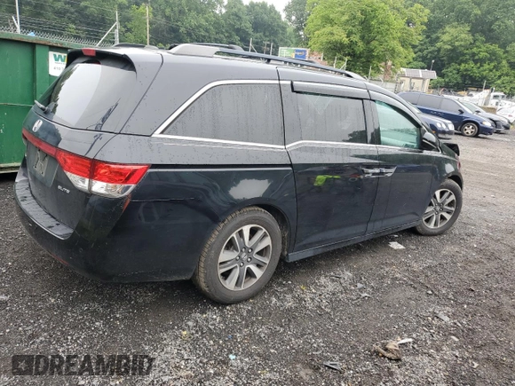 2016 Honda Odyssey Touring Elite with VIN 5FNRL5H90GB061827, listed as a Copart auction lot 61271695 with Not provided miles and Salvage title. Bid and sale history available at DreamBid. Image 3.