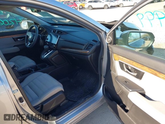 2018 Honda CR-V EX with VIN 7FARW2H56JE097214, listed as a IAAI auction lot 42061999 with 74,862 mi miles and . Bid and sale history available at DreamBid. Image 5.