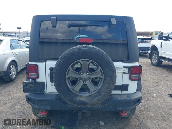 2017 Jeep Wrangler Unlimited Rubicon Recon with VIN 1C4BJWFG1HL693572, listed as a IAAI auction lot 42601855 with 64,342 mi miles and . Bid and sale history available at DreamBid. Image 16.