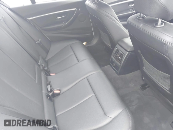 2018 BMW 3 Series 330i xDrive with VIN WBA8D9C52JEM32318, listed as a IAAI auction lot 42309352 with 61,828 mi miles and . Bid and sale history available at DreamBid. Image 8.