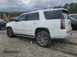 2015 GMC Yukon Denali with VIN 1GKS1CKJ1FR526594, listed as a Copart auction lot 46524205 with 99,095 mi miles and Salvage Title. Bid and sale history available at carsss.com. Image 2.