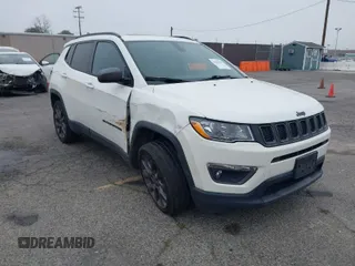 2021 Jeep Compass 80th Anniversary with VIN 3C4NJCEB4MT577055, listed as a IAAI auction lot 41847664 with 106,135 mi miles and . Bid and sale history available at carsss.com. Image 1.