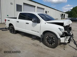 2019 Nissan Titan Pro-4X z VIN 1N6AA1E51KN526104, wystawiony jako Copart lot #51694335 z przebiegiem 56 620 mil mil oraz Szkoda całkowita • Salvage title. Historia ofert i sprzedaży dostępna na DreamBid. Obrazek 4.