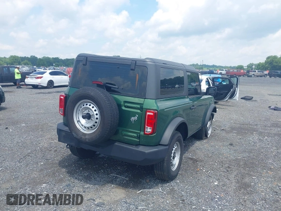 2022 Ford Bronco with VIN 1FMDE5AP3NLB62959, listed as a IAAI auction lot 42636180 with 33,827 mi miles and . Bid and sale history available at DreamBid. Image 4.