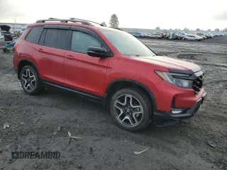 2023 Honda Passport Elite with VIN 5FNYF8H09PB016410, listed as a Copart auction lot 85071544 with 54,327 mi miles and Salvage Title. Bid and sale history available at carsss.com. Image 4.