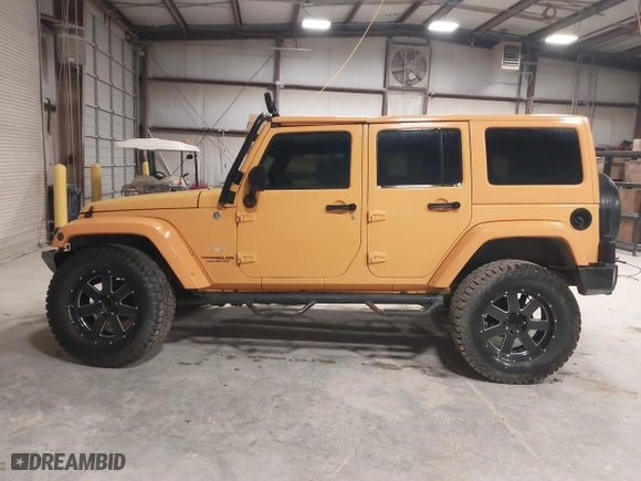 2012 Jeep Wrangler Unlimited Sahara with VIN 1C4HJWEG0CL173304, listed as a IAAI auction lot 41853457 with 278,324 mi miles. Bid and sale history available at carsss.com. Image 14.