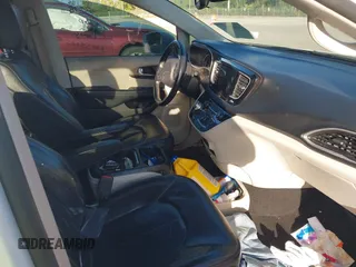 2017 Chrysler Pacifica Touring L with VIN 2C4RC1BG2HR526503, listed as a IAAI auction lot 40264571 with 136,262 mi miles and . Bid and sale history available at DreamBid. Image 5.