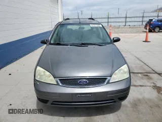 2006 Ford Focus SE with VIN 1FAHP36N56W223049, listed as a Copart auction lot 61211745 with 185,609 mi miles and Salvage title. Bid and sale history available at DreamBid. Image 5.