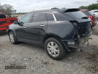 2016 Cadillac SRX Luxury Collection with VIN 3GYFNBE35GS569577, listed as a Copart auction lot 62568755 with 65,305 mi miles and Salvage title. Bid and sale history available at DreamBid. Image 2.