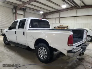 2004 Ford Super Duty F-250 XL with VIN 1FTNW20L14EC98612, listed as a Copart auction lot 84316824 with 183,876 mi miles and Salvage Title. Bid and sale history available at carsss.com. Image 2.