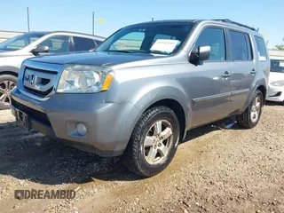 2009 Honda Pilot EX-L with VIN 5FNYF48539B035820, listed as a IAAI auction lot 41942149 with 242,463 mi miles. Bid and sale history available at carsss.com. Image 2.