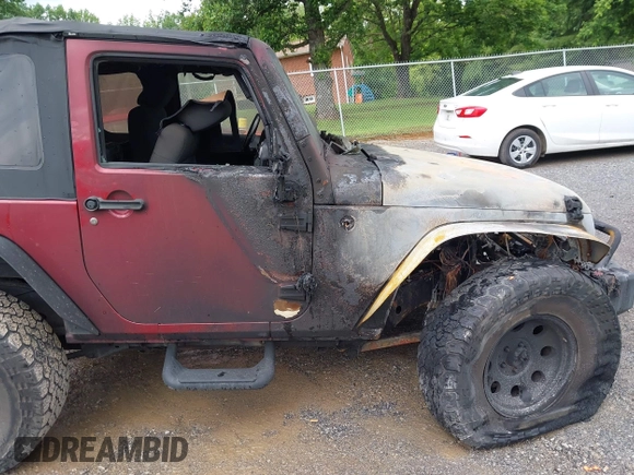 2012 Jeep Wrangler Sport with VIN 1C4AJWAG9CL203018, listed as a IAAI auction lot 42377899 with Not provided miles and . Bid and sale history available at DreamBid. Image 16.
