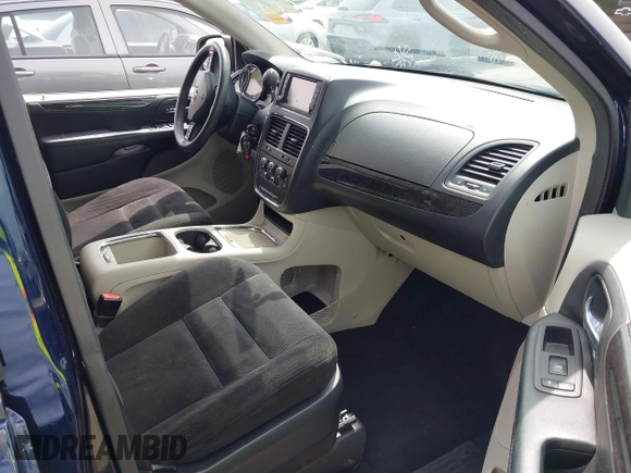 2015 Dodge Grand Caravan SXT with VIN 2C4RDGCG7FR524712, listed as a IAAI auction lot 41956063 with 111,144 mi miles and . Bid and sale history available at DreamBid. Image 5.