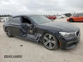 2017 BMW 7 Series 740i with VIN WBA7E2C37HG740680, listed as a Copart auction lot 45072763 with 76,828 mi miles. Bid and sale history available at carsss.com. Image 4.