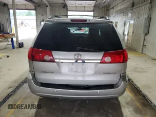 2010 Toyota Sienna XLE с VIN 5TDYK4CC9AS342961, выставлен на аукционе Copart как лот 60057105 с пробегом Не указан миль и Списание • Salvage title. История ставок и продаж доступна на DreamBid. Изображение 6.
