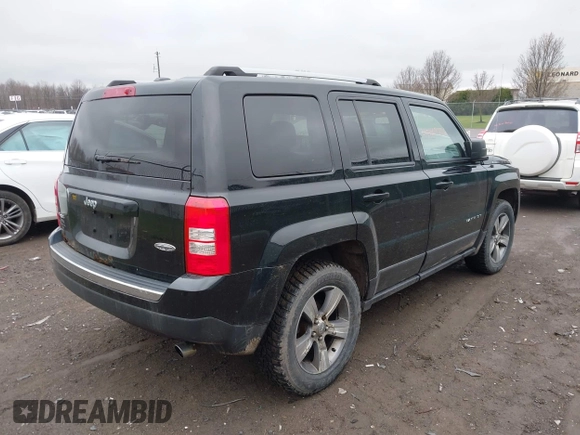 2016 Jeep Patriot Latitude with VIN 1C4NJRFB1GD523904, listed as a IAAI auction lot 42017736 with 164,705 mi miles. Bid and sale history available at carsss.com. Image 4.