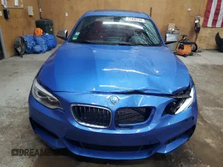 2015 BMW 2 Series M235i xDrive with VIN WBA1J9C59FV371308, listed as a Copart auction lot 77836744 with 89,334 mi miles and Clean Title. Bid and sale history available at carsss.com. Image 5.