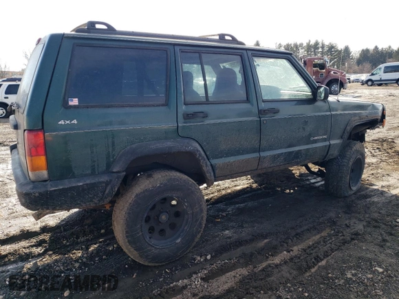 1999 Jeep Cherokee SE with VIN 1J4FF28S3XL551875, listed as a Copart auction lot 43057555 with 226,794 mi miles and Salvage title. Bid and sale history available at DreamBid. Image 3.