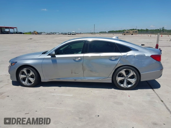 2019 Honda Accord Touring z VIN 1HGCV2F99KA002506, wystawiony jako IAAI lot #42233936 z przebiegiem 88 612 mil mil oraz . Historia ofert i sprzedaży dostępna na DreamBid. Obrazek 14.