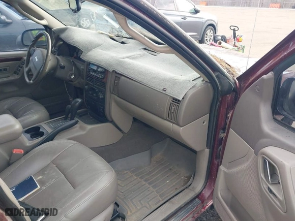 2002 Jeep Grand Cherokee Limited with VIN 1J8GW58N02C324540, listed as a IAAI auction lot 41476068 with 205,646 mi miles. Bid and sale history available at carsss.com. Image 5.