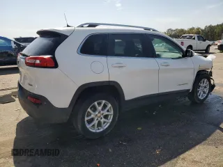 2016 Jeep Cherokee Altitude with VIN 1C4PJLCB9GW209643, listed as a Copart auction lot 47996565 with 167,005 mi miles and Salvage Title. Bid and sale history available at carsss.com. Image 3.