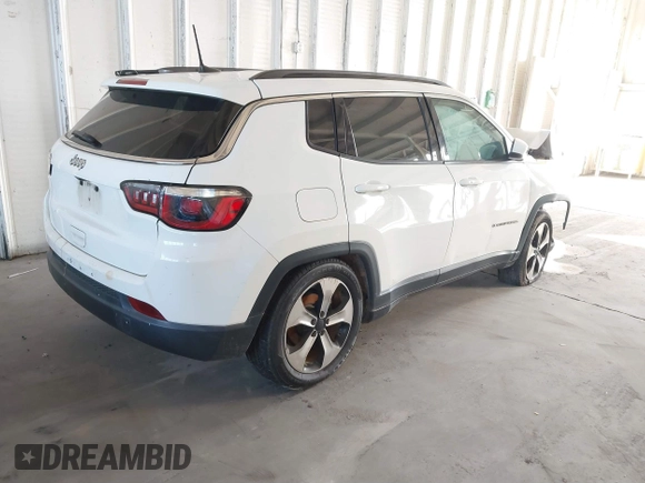 2019 Jeep Compass Latitude with VIN 3C4NJCBB9KT654889, listed as a IAAI auction lot 41406193 with 151,958 mi miles and . Bid and sale history available at DreamBid. Image 4.