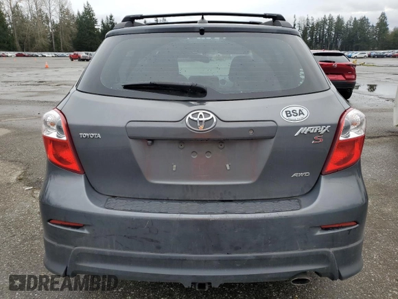 2009 Toyota Matrix S z VIN 2T1LE40E39C005200, wystawiony jako Copart lot #50124745 z przebiegiem 179 951 mil mil oraz Szkoda całkowita • Salvage title. Historia ofert i sprzedaży dostępna na DreamBid. Obrazek 6.