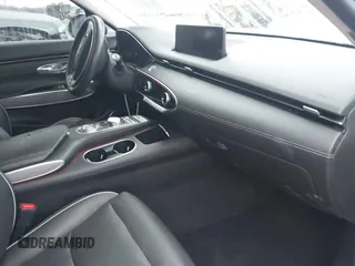 2022 Genesis GV70 2.5T с VIN KMUMADTB7NU050412, выставлен на аукционе IAAI как лот 41637025 с пробегом 53 407 миль миль и . История ставок и продаж доступна на DreamBid. Изображение 5.