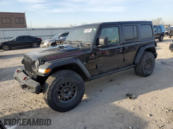 2021 Jeep Wrangler Unlimited Rubicon with VIN 1C4HJXFN6MW559471, listed as a Copart auction lot 48459855 with 33,495 mi miles and Salvage title. Bid and sale history available at DreamBid. Image 1.